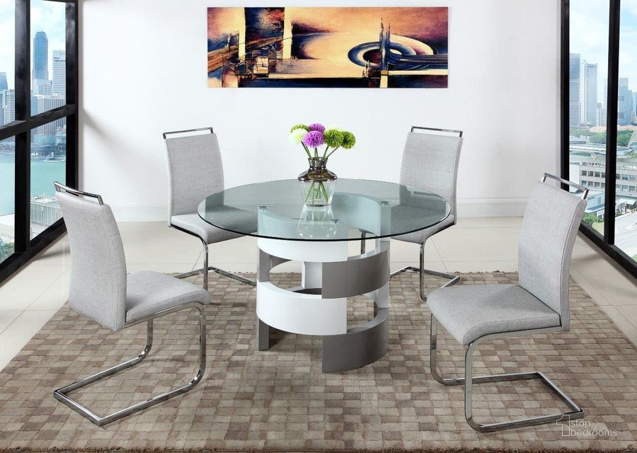 The appearance of Sunny Dining Set With Round Glass Table And Cantilever Chairs designed by Chintaly Imports in the modern / contemporary interior design. This  piece of furniture  was selected by 1StopBedrooms from Sunny Collection to add a touch of cosiness and style into your home. Sku: SUNNY-DT-T;SUNNY-DT-B;SUNNY-SC-GRY. Product Type: Dining Room Set.