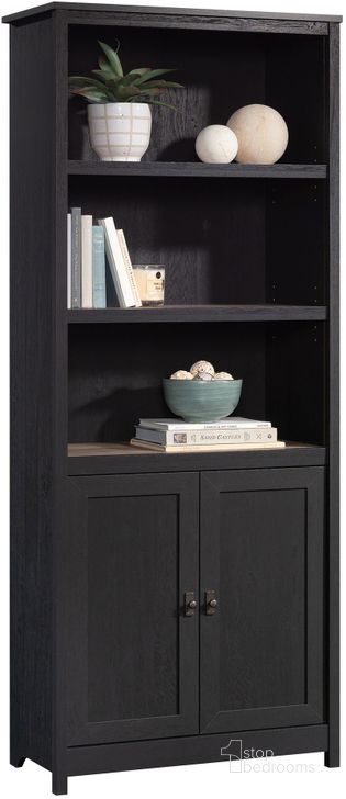 The appearance of Cottage Road Library With Doors In Raven Oak designed by Sauder in the country / farmhouse interior design. This raven oak piece of furniture  was selected by 1StopBedrooms from Cottage Road Collection to add a touch of cosiness and style into your home. Sku: 431262. Product Type: Bookcase. Material: Engineered Wood. Image1