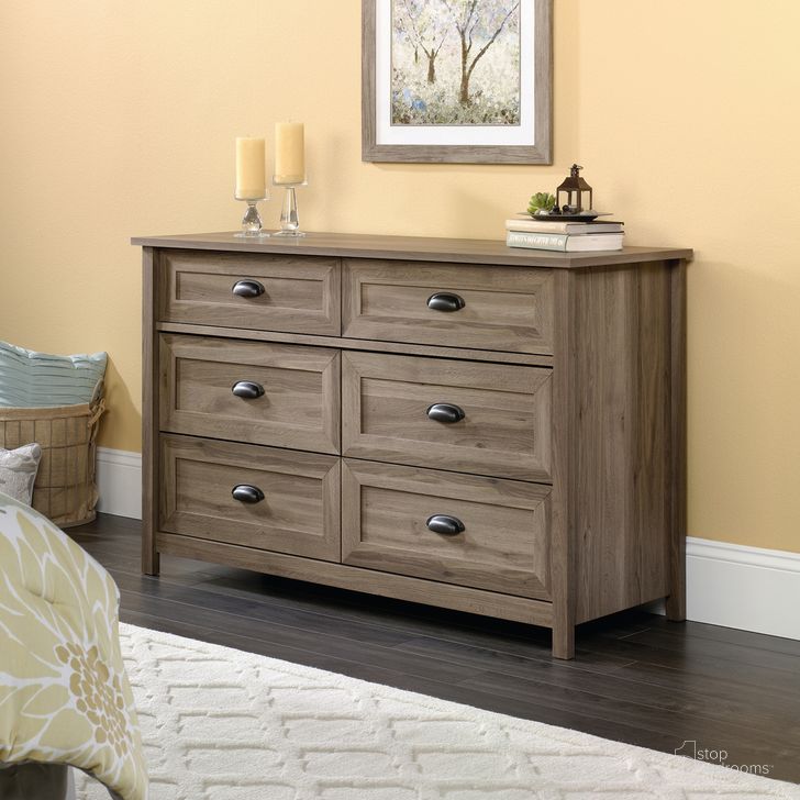 The appearance of County Line Dresser In Salt Oak designed by Sauder in the country / farmhouse interior design. This salt oak piece of furniture  was selected by 1StopBedrooms from County Line Collection to add a touch of cosiness and style into your home. Sku: 419320. Product Type: Dresser. Material: Engineered Wood. Image1