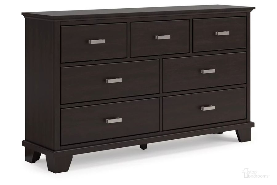 The appearance of Covetown Dresser In Dark Brown designed by Signature Design by Ashley in the modern / contemporary interior design. This dark brown piece of furniture  was selected by 1StopBedrooms from Covetown Collection to add a touch of cosiness and style into your home. Sku: B441-31. Material: Wood. Product Type: Dresser. Image1