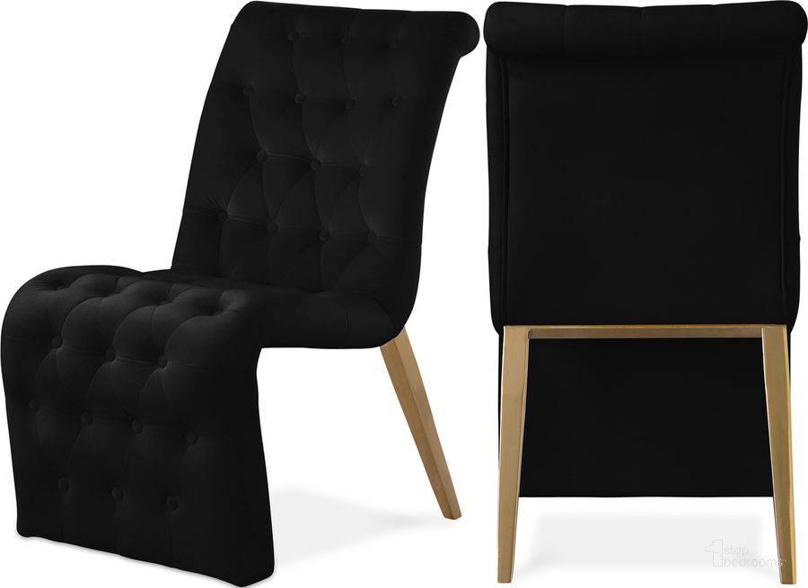 The appearance of Curve Velvet Dining Chair Set of 2 In Black designed by Meridian in the modern / contemporary interior design. This black velvet piece of furniture  was selected by 1StopBedrooms from Curve Collection to add a touch of cosiness and style into your home. Sku: 920Black-C. Material: Wood. Product Type: Dining Chair. Image1