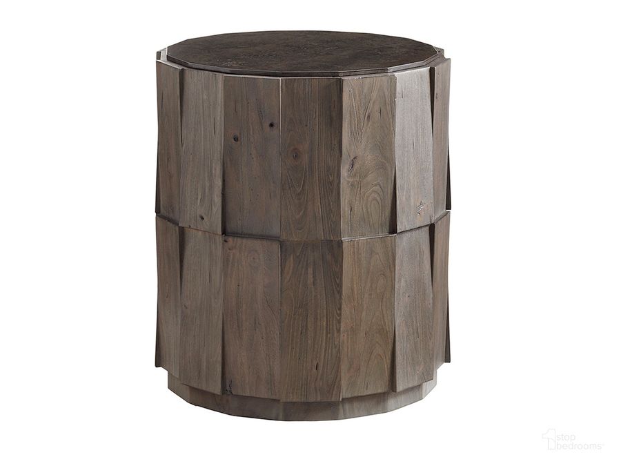 The appearance of Cypress Point Everett Round Travertine End Table designed by Tommy Bahama in the transitional interior design. This brown piece of furniture  was selected by 1StopBedrooms from Cypress Point Collection to add a touch of cosiness and style into your home. Sku: 01-0562-951. Material: Wood. Product Type: End Table. Image1
