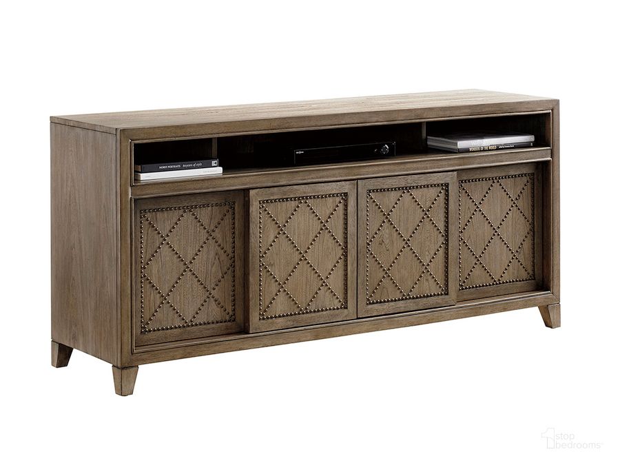 The appearance of Cypress Point Fairbanks Media Console designed by Tommy Bahama in the transitional interior design. This brown piece of furniture  was selected by 1StopBedrooms from Cypress Point Collection to add a touch of cosiness and style into your home. Sku: 01-0561-907. Material: Wood. Product Type: Media Console. Image1