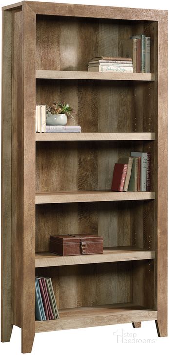 The appearance of Dakota Pass 5-Shelf Bookcase In Craftsman Oak designed by Sauder in the transitional interior design. This craftsman oak piece of furniture  was selected by 1StopBedrooms from Dakota Pass Collection to add a touch of cosiness and style into your home. Sku: 418546. Product Type: Bookcase. Material: Engineered Wood. Image1
