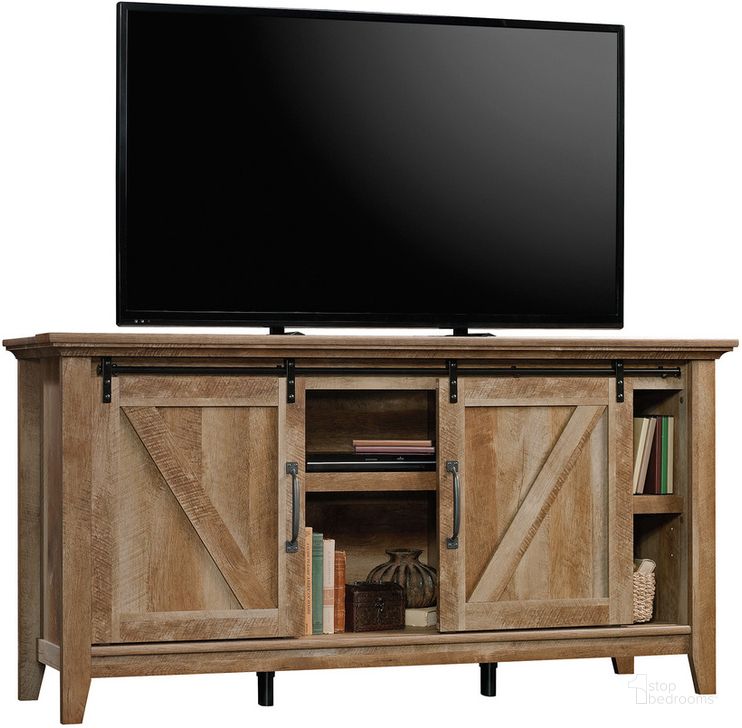 The appearance of Dakota Pass Credenza In Craftsman Oak designed by Sauder in the country / farmhouse interior design. This craftsman oak piece of furniture  was selected by 1StopBedrooms from Dakota Pass Collection to add a touch of cosiness and style into your home. Sku: 420820. Product Type: Credenza. Material: Engineered Wood. Image1