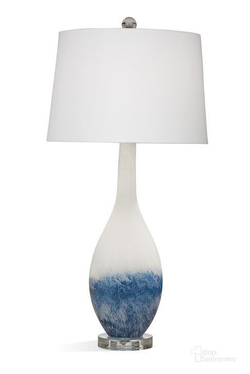 The appearance of Dancer Table Lamp In Blue and White designed by Bassett Mirror Company in the traditional interior design. This blue/white piece of furniture  was selected by 1StopBedrooms from  to add a touch of cosiness and style into your home. Sku: L4291T. Material: Glass. Product Type: Table Lamp. Image1