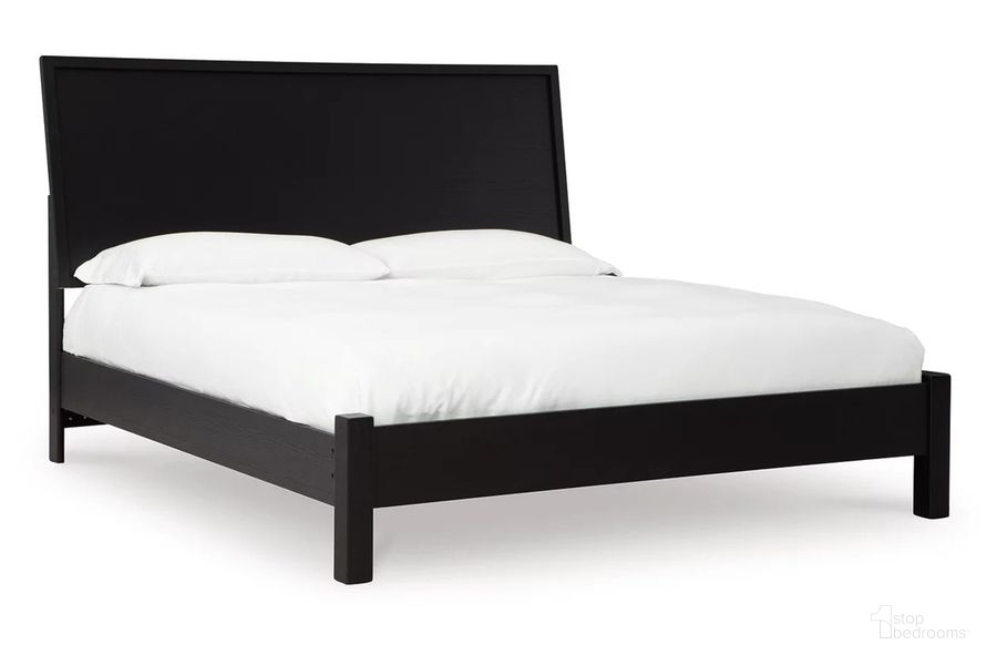 The appearance of Danziar King Panel Bed In Black designed by Signature Design by Ashley in the modern / contemporary interior design. This black piece of furniture  was selected by 1StopBedrooms from Danziar Collection to add a touch of cosiness and style into your home. Sku: B100-14;B1013-156;B1013-58. Bed Type: Panel Bed. Material: Wood. Product Type: Panel Bed. Bed Size: King. Image1