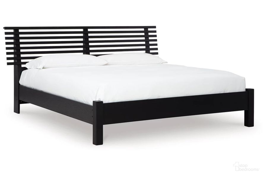 The appearance of Danziar Queen Slat Panel Bed In Black designed by Signature Design by Ashley in the modern / contemporary interior design. This black piece of furniture  was selected by 1StopBedrooms from Danziar Collection to add a touch of cosiness and style into your home. Sku: B100-13;B1013-154;B1013-157. Bed Type: Panel Bed. Material: Wood. Product Type: Panel Bed. Bed Size: Queen. Image1
