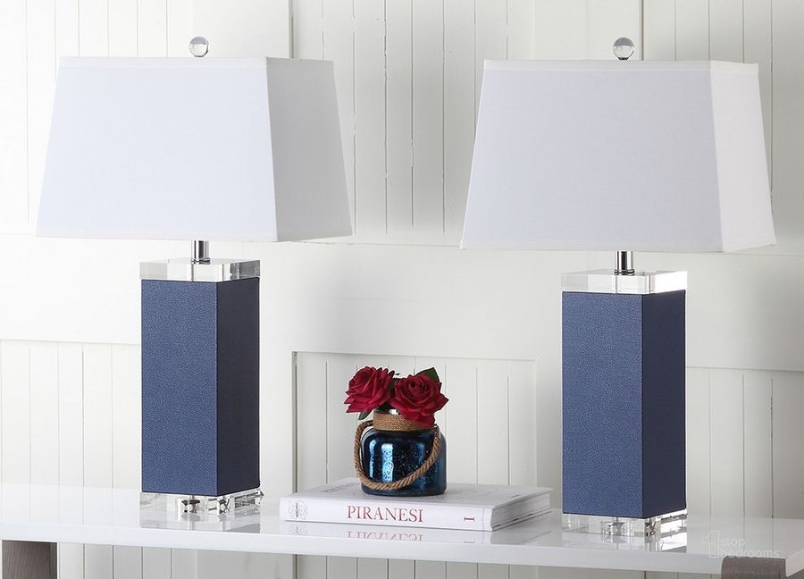 The appearance of Deco Navy and Off-White 27 Inch Leather Table Lamp Set of 2 designed by Safavieh in the modern / contemporary interior design. This navy piece of furniture  was selected by 1StopBedrooms from Deco Collection to add a touch of cosiness and style into your home. Sku: LIT4143A-SET2. Product Type: Table Lamp. Image1