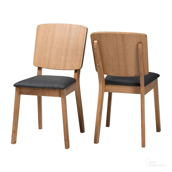 The appearance of Denmark Fabric and Rubberwood Dining Chair Set of 2 In Dark Grey and Oak Brown designed by Baxton Studio in the transitional interior design. This grey/brown piece of furniture  was selected by 1StopBedrooms from Denmark Collection to add a touch of cosiness and style into your home. Sku: Denmark-French Oak-DC. Product Type: Dining Chair. Material: Rubberwood. Image1