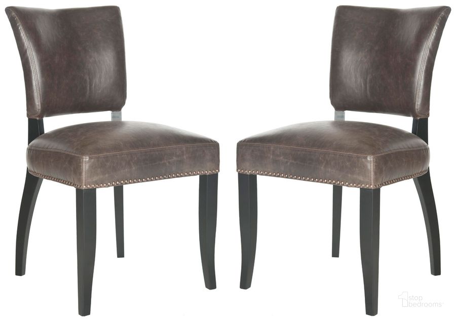 The appearance of Desa Antique Brown and Black Side Chair with Brass Nailhead Detail Set of 2 designed by Safavieh in the transitional interior design. This antique brown piece of furniture  was selected by 1StopBedrooms from Desa Collection to add a touch of cosiness and style into your home. Sku: MCR4690A-SET2. Material: Wood. Product Type: Dining Chair. Image1