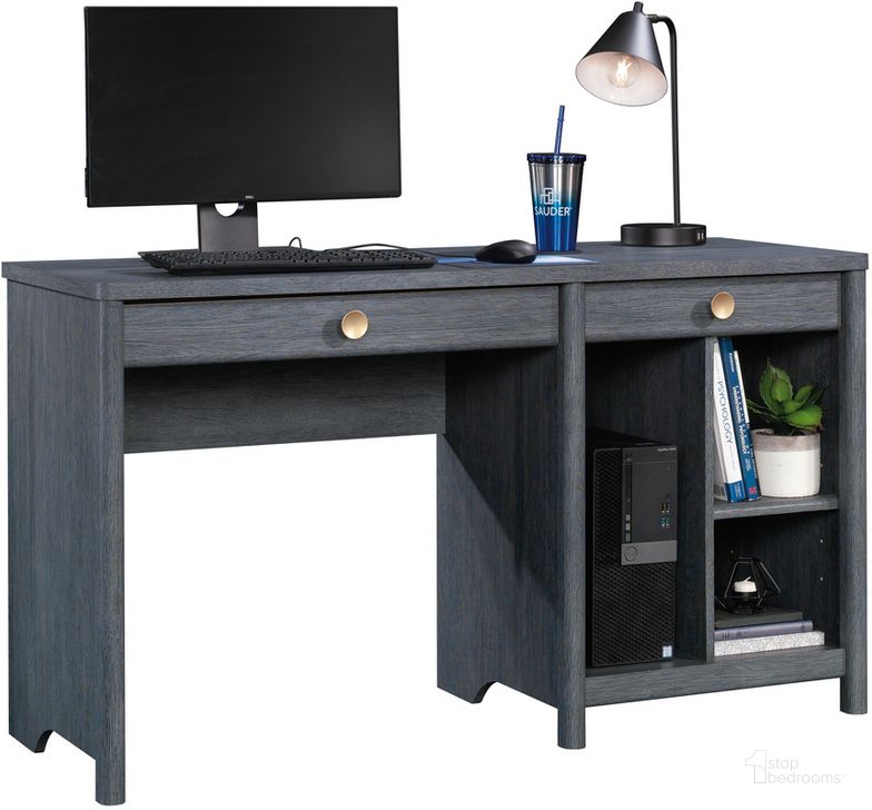 The appearance of Dover Edge Computer Desk In Denim Oak designed by Sauder in the transitional interior design. This denim oak piece of furniture  was selected by 1StopBedrooms from Dover Edge Collection to add a touch of cosiness and style into your home. Sku: 433527. Product Type: Computer Desk. Image1