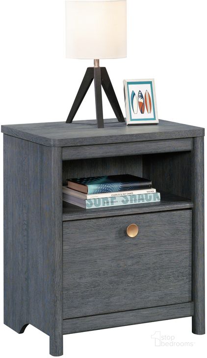 The appearance of Dover Edge Night Stand In Denim Oak designed by Sauder in the transitional interior design. This denim oak piece of furniture  was selected by 1StopBedrooms from Dover Edge Collection to add a touch of cosiness and style into your home. Sku: 433522. Product Type: Nightstand. Material: Engineered Wood. Image1