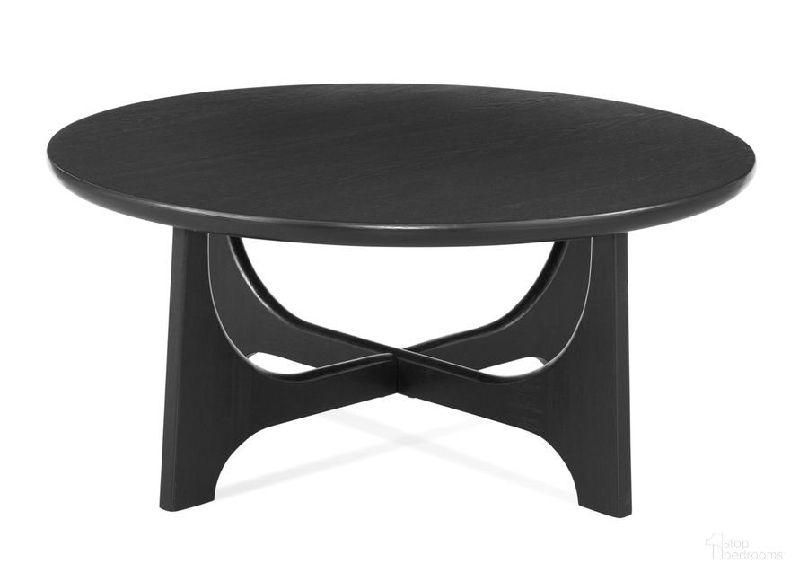 The appearance of Dunnigan Round Cocktail Table In Black designed by Bassett Mirror Company in the modern / contemporary interior design. This black piece of furniture  was selected by 1StopBedrooms from Dunnigan Collection to add a touch of cosiness and style into your home. Sku: 7049-LR-120EC. Material: Wood. Product Type: Cocktail Table. Image1