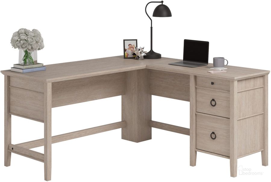 The appearance of East Adara L-Shaped Desk In Cascade Oak designed by Sauder in the traditional interior design. This cascade oak piece of furniture  was selected by 1StopBedrooms from East Adara Collection to add a touch of cosiness and style into your home. Sku: 429772. Product Type: Desk. Material: Engineered Wood. Image1