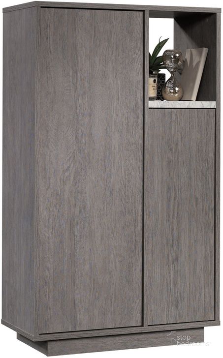 The appearance of East Rock Storage Cabinet In Ashen Oak designed by Sauder in the transitional interior design. This ashen oak piece of furniture  was selected by 1StopBedrooms from East Rock Collection to add a touch of cosiness and style into your home. Sku: 431753. Product Type: Storage Cabinet. Material: Engineered Wood. Image1