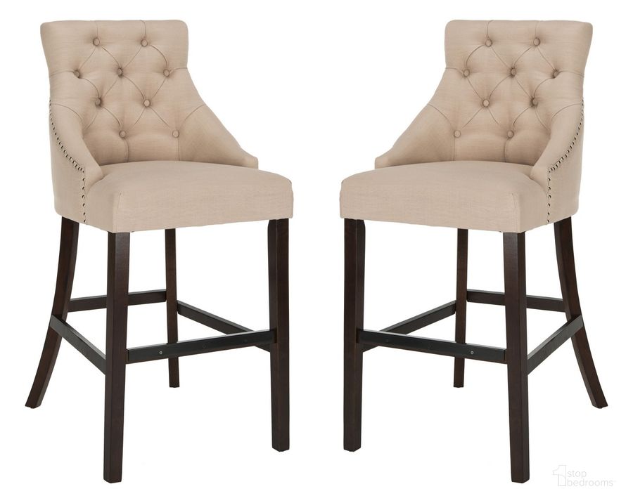 The appearance of Eleni Beige Tufted Wing Back Bar Stool Set of 2 designed by Safavieh in the modern / contemporary interior design. This beige piece of furniture  was selected by 1StopBedrooms from Eleni Collection to add a touch of cosiness and style into your home. Sku: BST6304E-SET2. Material: Wood. Product Type: Barstool. Image1