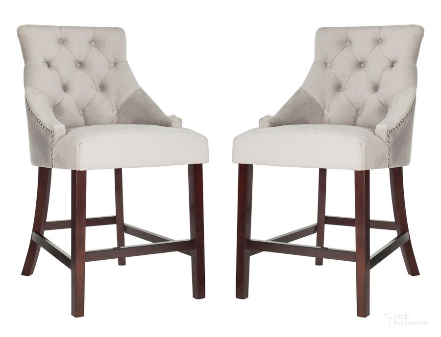 The appearance of Eleni Grey Tufted Wing Back Counter Stool Set of 2 designed by Safavieh in the modern / contemporary interior design. This gray piece of furniture  was selected by 1StopBedrooms from Eleni Collection to add a touch of cosiness and style into your home. Sku: BST6305B-SET2. Material: Wood. Product Type: Barstool. Image1