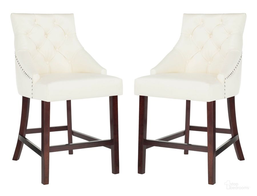 The appearance of Eleni White Tufted Wing Back Counter Stool Set of 2 designed by Safavieh in the modern / contemporary interior design. This white piece of furniture  was selected by 1StopBedrooms from Eleni Collection to add a touch of cosiness and style into your home. Sku: BST6305G-SET2. Material: Wood. Product Type: Barstool. Image1
