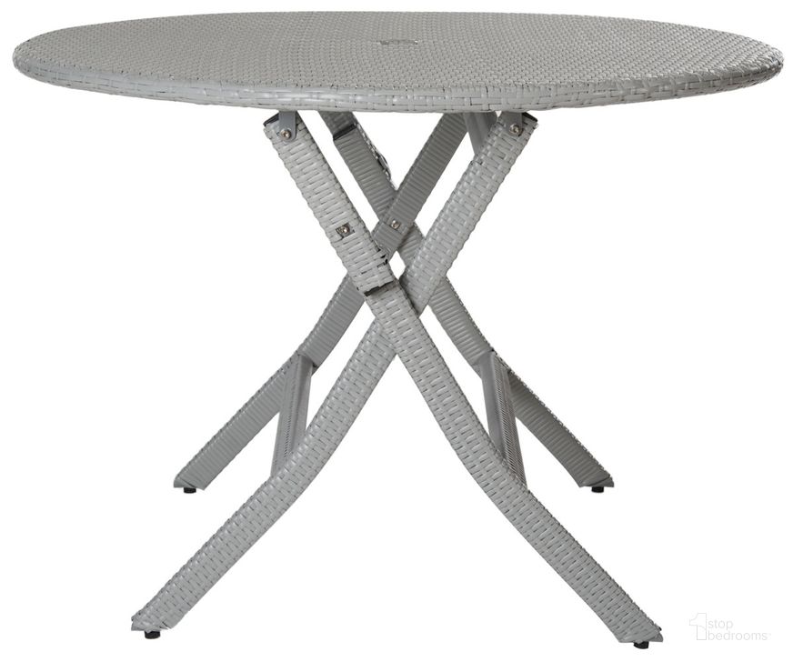The appearance of Ellis Round Folding Table in Grey designed by Safavieh in the modern / contemporary interior design. This grey piece of furniture  was selected by 1StopBedrooms from Ellis Collection to add a touch of cosiness and style into your home. Sku: PAT2001B. Material: Rattan. Product Type: Outdoor Table. Image1