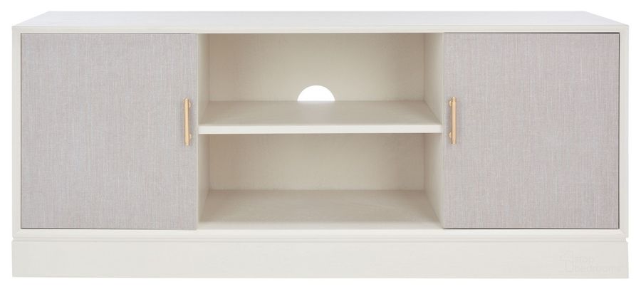 The appearance of Estella 2Dr 1 Shelf Media Stand in White designed by Safavieh in the modern / contemporary interior design. This white piece of furniture  was selected by 1StopBedrooms from Estella Collection to add a touch of cosiness and style into your home. Sku: MED5711A. Material: Wood. Product Type: Media Unit. Image1