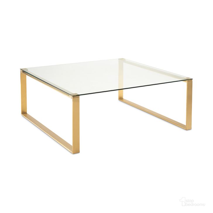 The appearance of Fab Coffee Table In Gold designed by Uptown Club in the modern / contemporary interior design. This gold piece of furniture  was selected by 1StopBedrooms from Fab Collection to add a touch of cosiness and style into your home. Sku: GM4404. Product Type: Coffee Table. Material: Stainless Steel. Image1