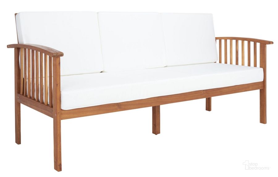 The appearance of Finnick Outdoor Bench in Beige PAT7303A designed by Safavieh in the modern / contemporary interior design. This beige piece of furniture  was selected by 1StopBedrooms from Finnick Collection to add a touch of cosiness and style into your home. Sku: PAT7303A. Material: Wood. Product Type: Outdoor Bench. Image1