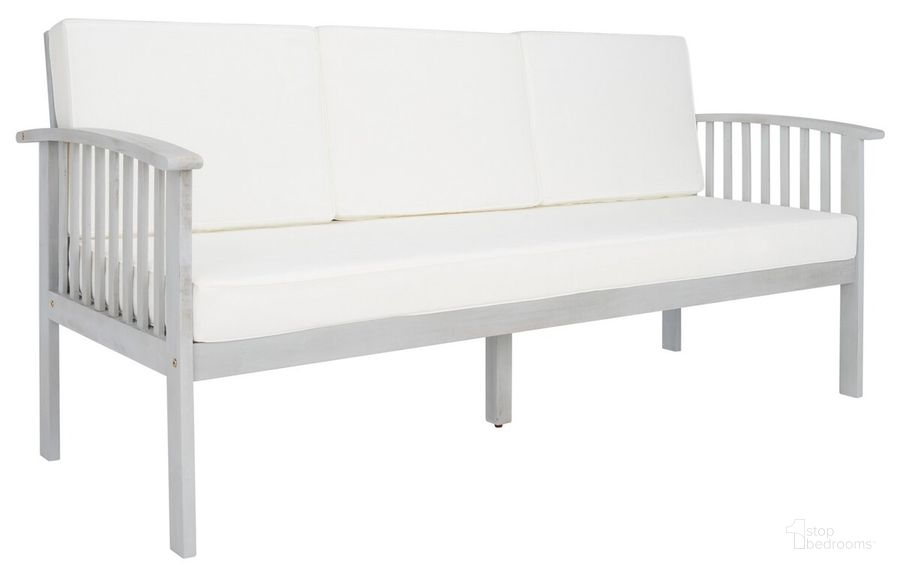 The appearance of Finnick Outdoor Bench in Beige PAT7303B designed by Safavieh in the modern / contemporary interior design. This gray piece of furniture  was selected by 1StopBedrooms from Finnick Collection to add a touch of cosiness and style into your home. Sku: PAT7303B. Material: Wood. Product Type: Outdoor Bench. Image1