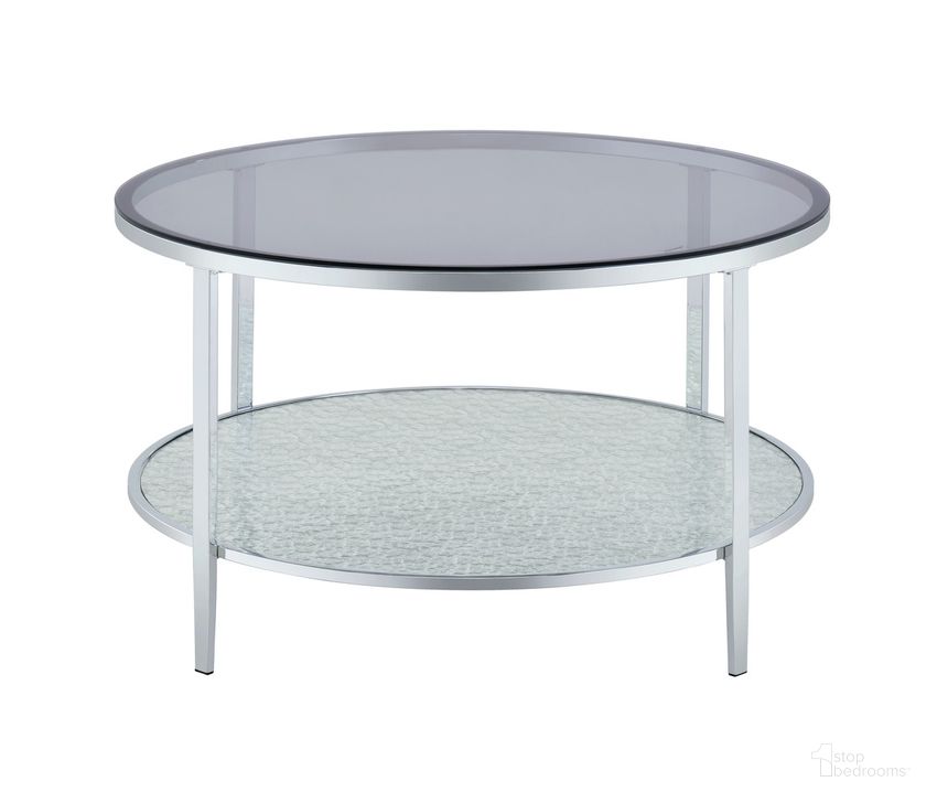 The appearance of Frostine Round Cocktail Table In Silver designed by Steve Silver in the modern / contemporary interior design. This silver piece of furniture  was selected by 1StopBedrooms from Frostine Collection to add a touch of cosiness and style into your home. Sku: FS700C. Material: Glass. Product Type: Cocktail Table. Image1