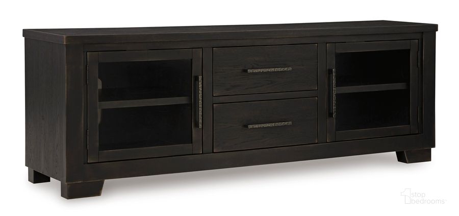The appearance of Galliden 80 Inch TV Stand In Black designed by Signature Design by Ashley in the modern / contemporary interior design. This black piece of furniture  was selected by 1StopBedrooms from Galliden Collection to add a touch of cosiness and style into your home. Sku: W841-168. Material: Wood. Product Type: TV Stand. Image1