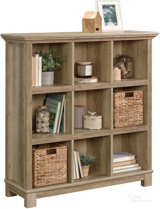 The appearance of Garden Villa 9-Cube Organizer In Orchard Oak designed by Sauder in the country / farmhouse interior design. This orchard oak piece of furniture  was selected by 1StopBedrooms from Garden Villa Collection to add a touch of cosiness and style into your home. Sku: 424101. Product Type: Storage and Organization. Material: Engineered Wood. Image1