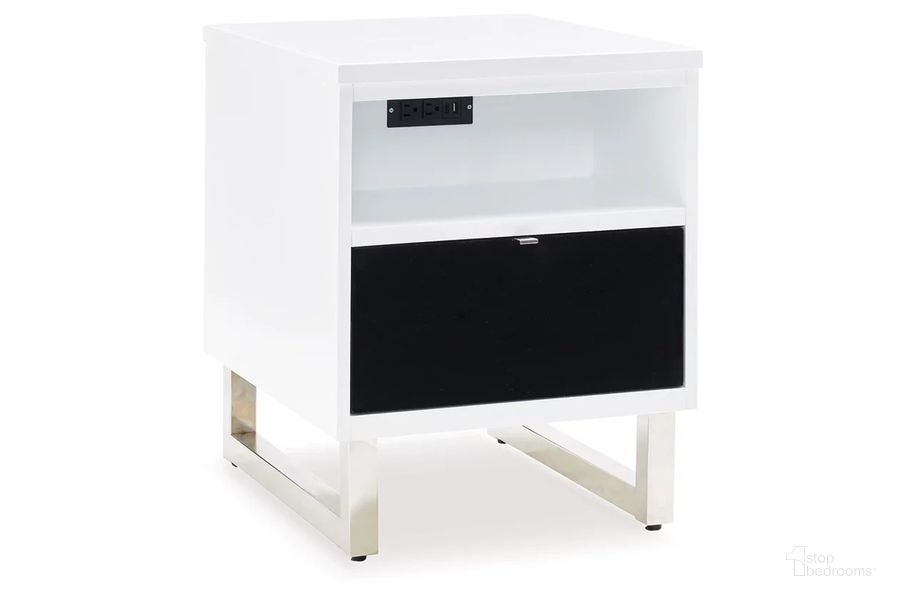 The appearance of Gardoni Chairside End Table In White And Black designed by Signature Design by Ashley in the modern / contemporary interior design. This white/black piece of furniture  was selected by 1StopBedrooms from Gardoni Collection to add a touch of cosiness and style into your home. Sku: T756-7. Material: Wood. Product Type: End Table. Image1