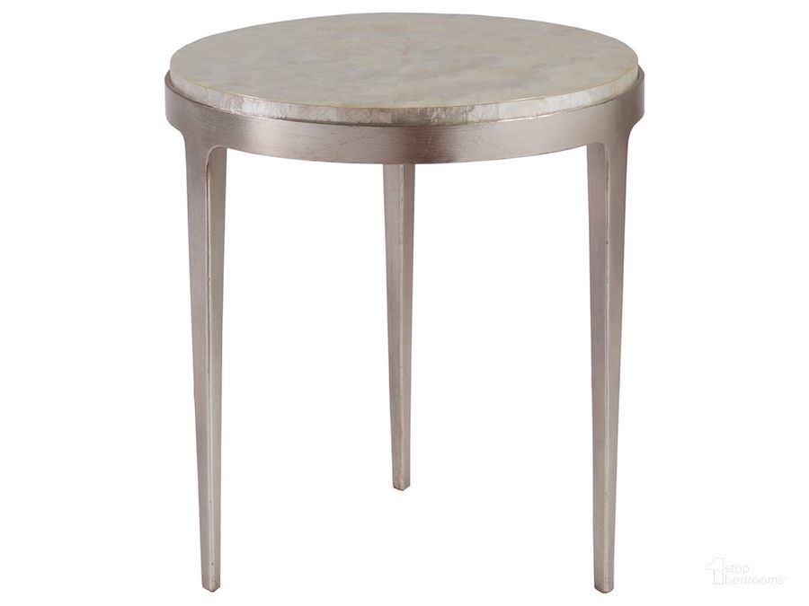 The appearance of Gravitas Champagne Foil Round Spot Table designed by Artistica Home in the industrial interior design. This silver piece of furniture  was selected by 1StopBedrooms from Gravitas Collection to add a touch of cosiness and style into your home. Sku: 01-2050-950. Product Type: End Table. Image1