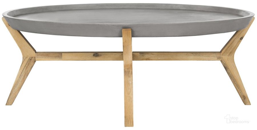 The appearance of Hadwin Dark Grey Modern Concrete Oval Indoor/Outdoor Coffee Table designed by Safavieh in the modern / contemporary interior design. This dark grey piece of furniture  was selected by 1StopBedrooms from Safavieh VNN Collection to add a touch of cosiness and style into your home. Sku: VNN1021A. Product Type: Coffee Table. Image1