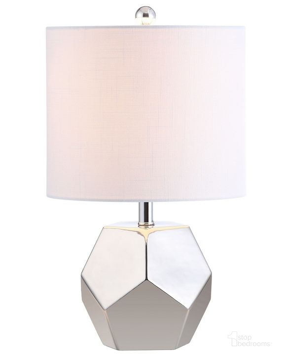 The appearance of Hanton Plated Silver Table Lamp designed by Safavieh in the modern / contemporary interior design. This silver piece of furniture  was selected by 1StopBedrooms from Safavieh TBL Collection to add a touch of cosiness and style into your home. Sku: TBL4094A. Material: Chrome. Product Type: Table Lamp. Image1