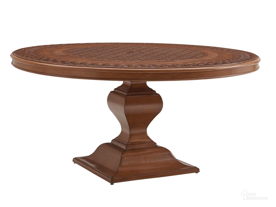 The appearance of Harbor Isle Round Dining Table designed by Tommy Bahama in the transitional interior design. This walnut piece of furniture  was selected by 1StopBedrooms from Harbor Collection to add a touch of cosiness and style into your home. Sku: 01-3935-875C. Table Base Style: Pedestal. Table Top Shape: Round. Product Type: Dining Table. Size: 60". Image1