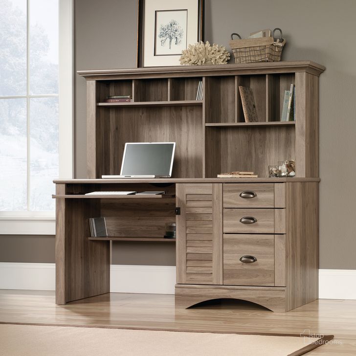 The appearance of Harbor View Computer Desk With Hutch In Salt Oak designed by Sauder in the country / farmhouse interior design. This salt oak piece of furniture  was selected by 1StopBedrooms from Harbor View Collection to add a touch of cosiness and style into your home. Sku: 415109. Product Type: Computer Desk. Material: Engineered Wood. Image1