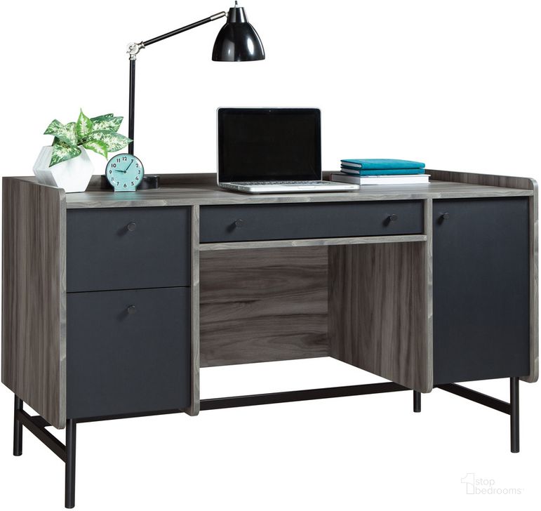 The appearance of Harvey Park Desk In Jet Acacia designed by Sauder in the modern / contemporary interior design. This jet acacia piece of furniture  was selected by 1StopBedrooms from Harvey Park Collection to add a touch of cosiness and style into your home. Sku: 428189. Product Type: Desk. Material: Engineered Wood. Image1