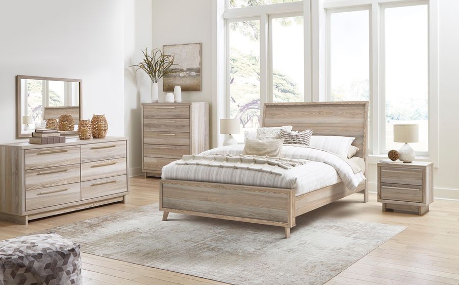 The appearance of Hasbrick Tan Panel Bedroom Set with Footboard designed by Signature Design by Ashley in the transitional interior design. This tan piece of furniture  was selected by 1StopBedrooms from Hasbrick Collection to add a touch of cosiness and style into your home. Sku: B100-13;B2075-54;B2075-57;B2075-95;B2075-92. Material: Wood. Product Type: Bedroom Set. Bed Size: Queen. Image1