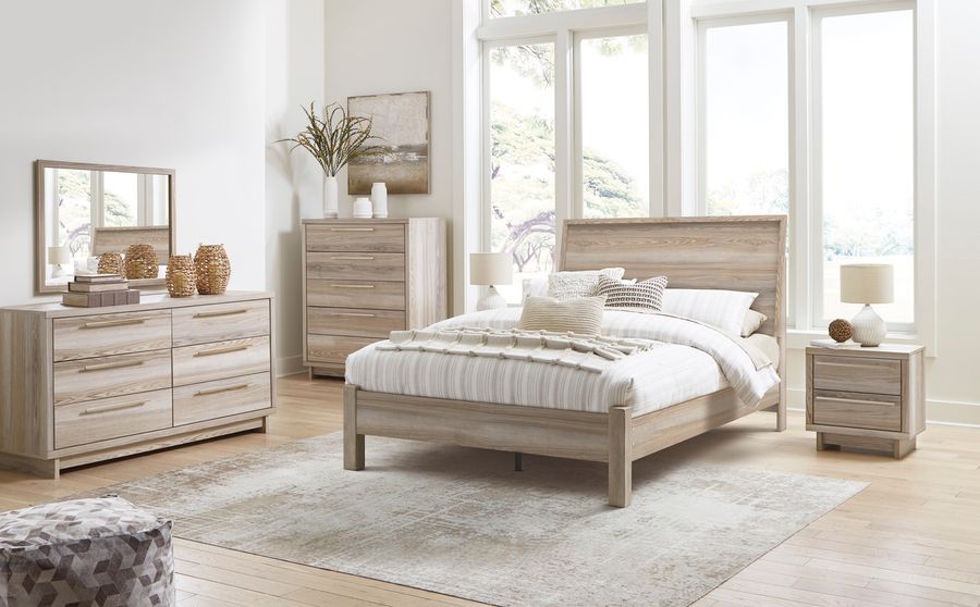 The appearance of Hasbrick Tan Panel Bedroom Set designed by Signature Design by Ashley in the transitional interior design. This tan piece of furniture  was selected by 1StopBedrooms from Hasbrick Collection to add a touch of cosiness and style into your home. Sku: B100-13;B2075-154;B2075-57;B2075-92. Material: Wood. Product Type: Bedroom Set. Bed Size: Queen. Image1