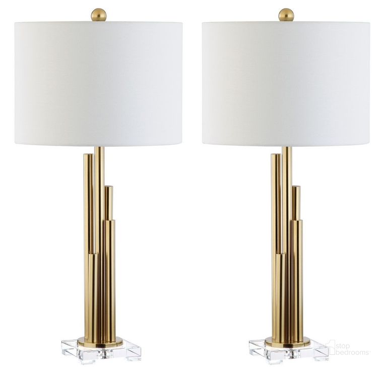 The appearance of Hopper Brass Gold Table Lamp Set of 2 designed by Safavieh in the modern / contemporary interior design. This gold piece of furniture  was selected by 1StopBedrooms from Safavieh TBL Collection to add a touch of cosiness and style into your home. Sku: TBL4060A-SET2. Product Type: Table Lamp. Material: Brass. Image1