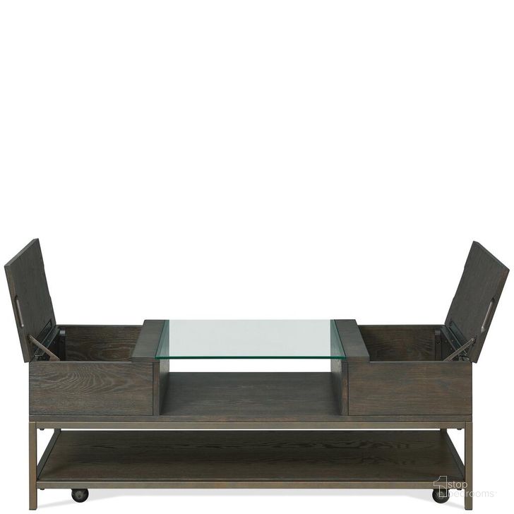 The appearance of Hyde Rectangular Coffee Table In Caviar designed by Riverside Furniture in the modern / contemporary interior design. This caviar piece of furniture  was selected by 1StopBedrooms from Hyde Collection to add a touch of cosiness and style into your home. Sku: 92802. Product Type: Coffee Table. Image1