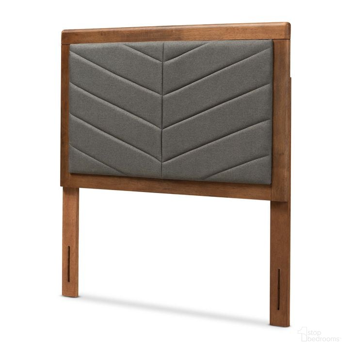 The appearance of Iden Fabric Upholstered and Wood Twin Headboard In Dark Grey and Walnut Brown designed by Baxton Studio in the transitional interior design. This grey/brown piece of furniture  was selected by 1StopBedrooms from Iden Collection to add a touch of cosiness and style into your home. Sku: MG9733-Dark Grey/Walnut-Twin-HB. Product Type: Headboard. Material: Rubberwood. Image1