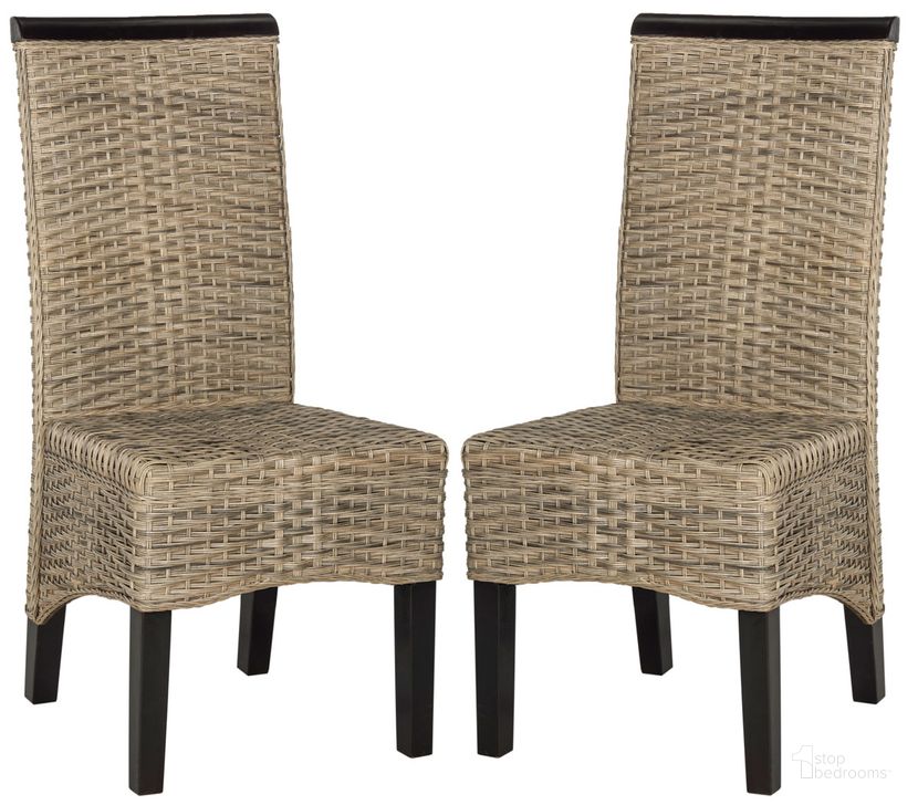 The appearance of Ilya Gray Wicker Dining Chair Set of 2 designed by Safavieh in the traditional interior design. This grey piece of furniture  was selected by 1StopBedrooms from Ilya Collection to add a touch of cosiness and style into your home. Sku: SEA8017A-SET2. Product Type: Dining Chair. Material: Rattan. Image1
