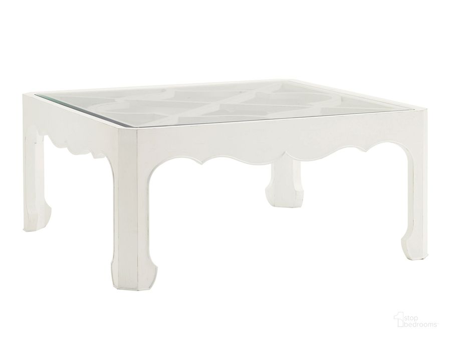 The appearance of Ivory Key Cassava Cocktail Table designed by Tommy Bahama in the transitional interior design. This white piece of furniture  was selected by 1StopBedrooms from Ivory Key Collection to add a touch of cosiness and style into your home. Sku: 01-0543-947. Material: Glass. Product Type: Cocktail Table. Image1
