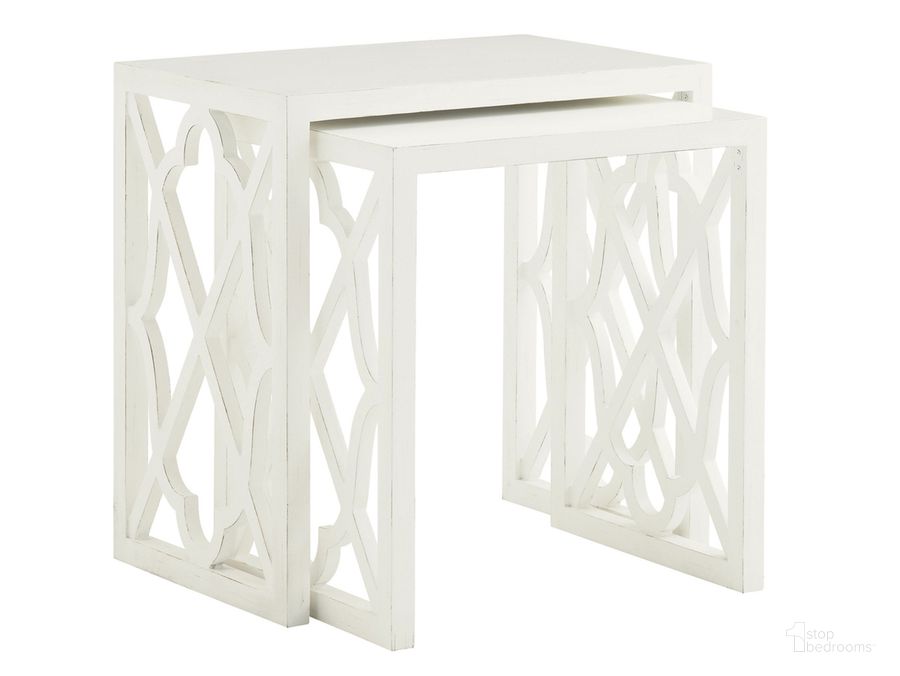 The appearance of Ivory Key Stovell Ferry Nesting Tables designed by Tommy Bahama in the transitional interior design. This white piece of furniture  was selected by 1StopBedrooms from Ivory Key Collection to add a touch of cosiness and style into your home. Sku: 01-0543-957. Material: Glass. Product Type: Nesting Table. Image1
