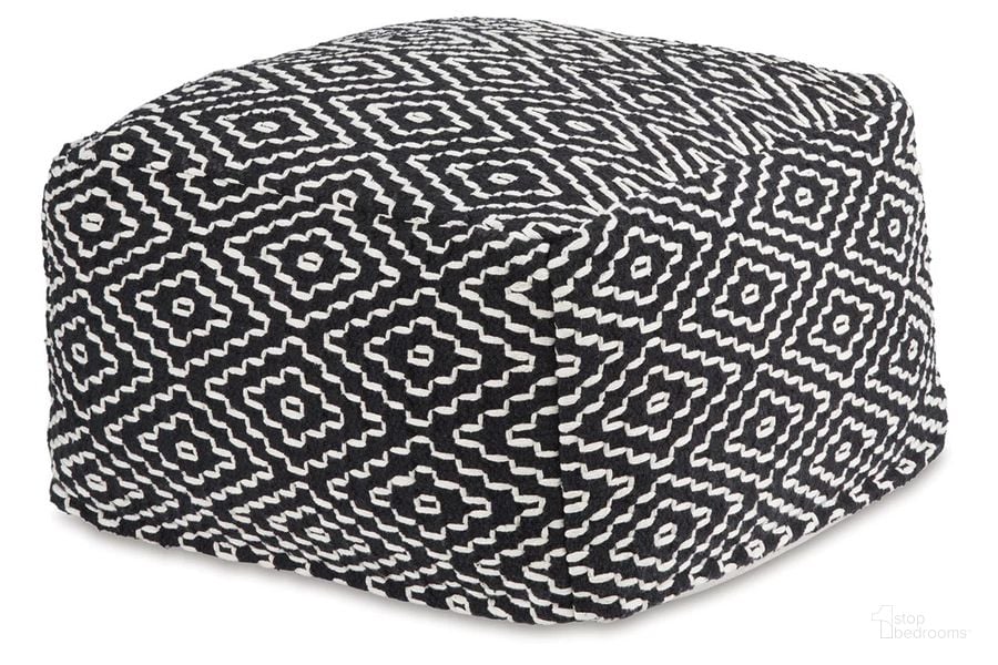 The appearance of Jasett Pouf In Black And Ivory designed by Signature Design by Ashley in the transitional interior design. This black/ivory piece of furniture  was selected by 1StopBedrooms from Jasett Collection to add a touch of cosiness and style into your home. Sku: A1001058. Product Type: Ottoman. Image1