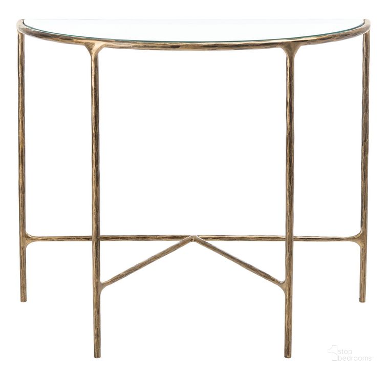 The appearance of Jessa Forged Metal Console Table In Brass designed by Safavieh Couture in the glam interior design. This brass piece of furniture  was selected by 1StopBedrooms from Jessa Collection to add a touch of cosiness and style into your home. Sku: SFV9506A. Material: Metal. Product Type: Console Table. Image1