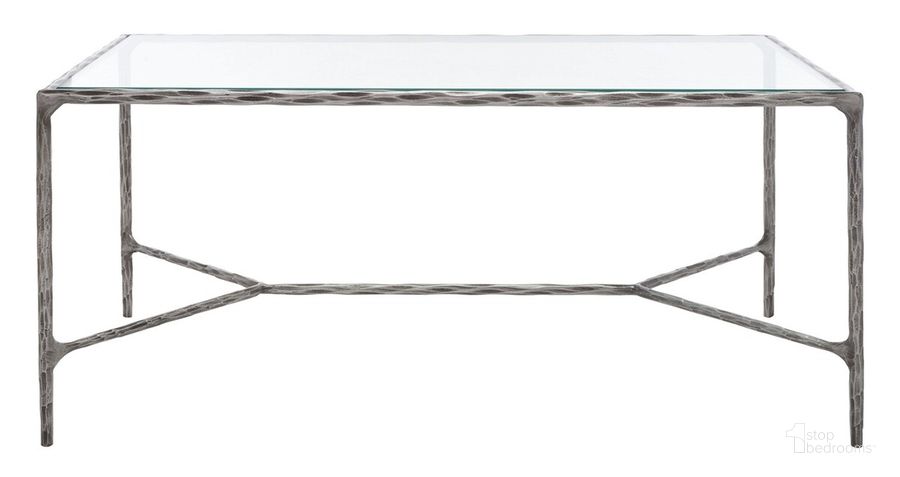 The appearance of Jessa Metal Coffee Table In Silver designed by Safavieh Couture in the modern / contemporary interior design. This silver piece of furniture  was selected by 1StopBedrooms from Jessa Collection to add a touch of cosiness and style into your home. Sku: SFV9520B. Product Type: Coffee Table. Material: Iron. Image1