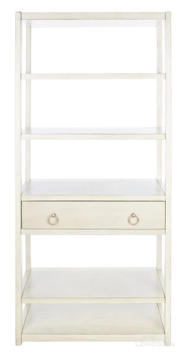 The appearance of Johni 1 Drawer 5 Shelf Etagere in Antique White designed by Safavieh in the modern / contemporary interior design. This antique white piece of furniture  was selected by 1StopBedrooms from Johni Collection to add a touch of cosiness and style into your home. Sku: ETG9200B. Material: Wood. Product Type: Etagere. Image1